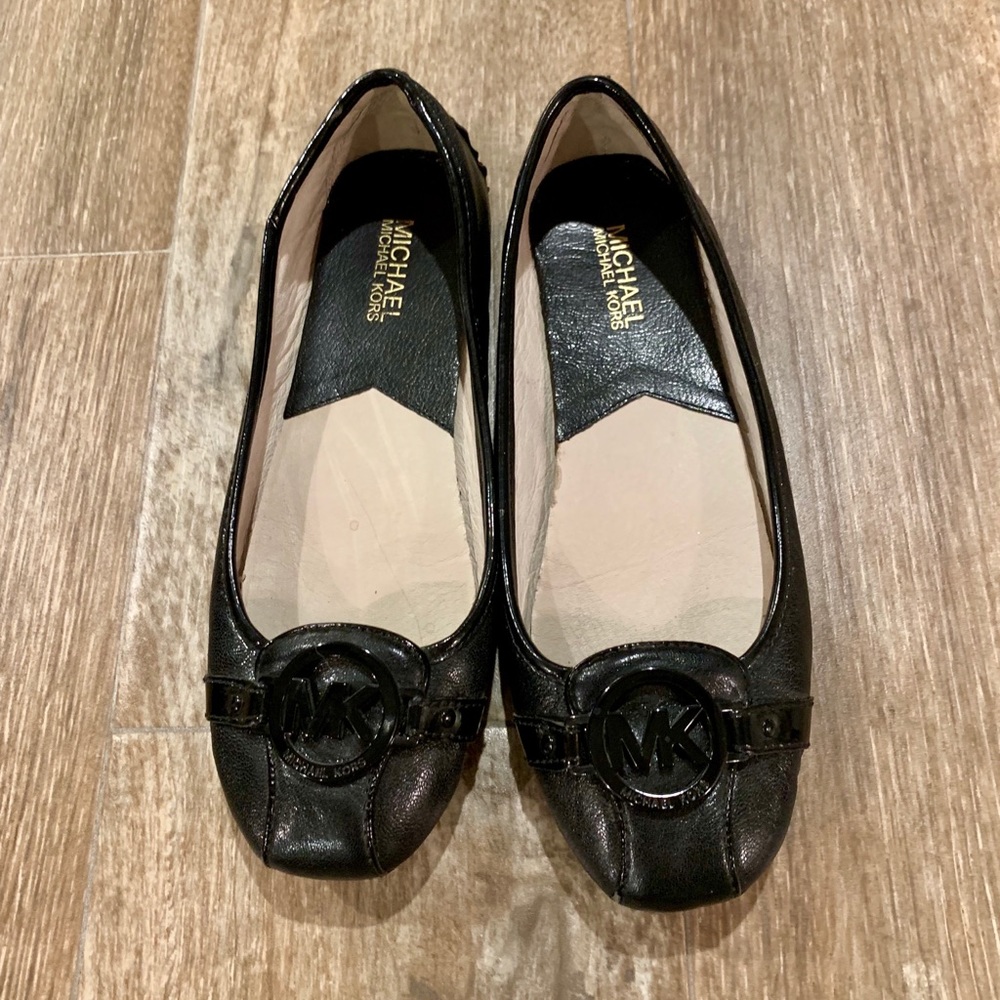 Black MK flats